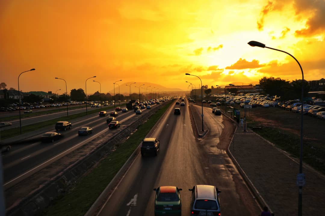 A snapshot of a section of Abuja arterial taken from an overhead pedestrian bridge at sunset